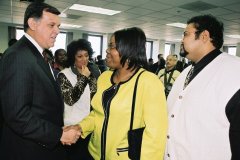 Photo 5: Following his remarks, the Secretary shook hands and met as many HUD staff as possible