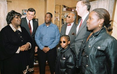 Photo 6: Secretary Martinez traveled to Mt. Vernon in Westchester County, New York. Governor George Pataki of New York and Mayor Ernie Davis of Mt. Vernon, met him at the home of Diane Brown, a former public housing resident from the Bronx who received a grant in order to make the down payment on her current home