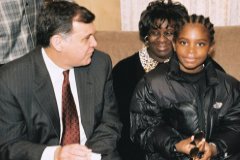 Photo 6: Secretary Martinez with Diane Brown and her son Barry, who turned eight years old on the day of the visit