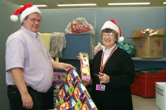 Photo 2:  Packing gifts for two adopted  families]