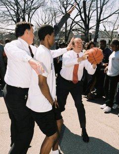 Photo 11: The Secretary also made time, following his visit to the Brown family's new home, to shoot hoops with some local neighborhood residents