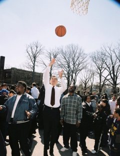 Photo 11: The Secretary also made time, following his visit to the Brown family's new home, to shoot hoops with some local neighborhood residents