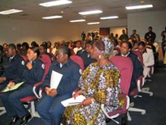 [Photo 1: Attendees]