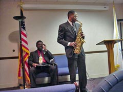 [Photo 2: Nashville CPD employee Clinton Johnson plays a jazzy solo]