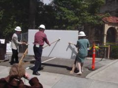 Photo 1: Sister Amy Bailey of Mercy Housing California joined in the wall breaking ceremony, symbolizing the rehabilitation of the historic building.