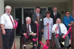 [Photo 1: Ribbon-cutting ceremony to celebrate the opening of the Webb Park Apartments.]