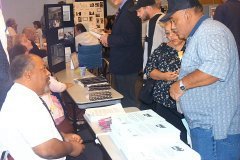 [Photo 2: Persons with disabilities who were interested in subsidized housing received an informational piece.]