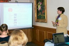 [Photo 2: Presentations to provide an overview HUD resources]