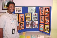 [Photo 2: A happy Youthbuild graduate.]