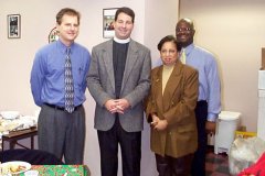 [Photo 1: Principal Tom Benton, Director Reverend Stephen Carpenter, and HUD staffers Bwendolyn Scott and Joseph Thomas]