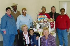 [Photo: Hud staffers deliver donations to the food pantry.]