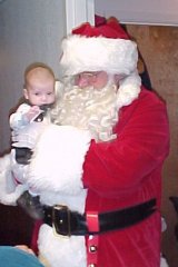 [Photo 2: A special visit from Santa Claus (Anchorage HUD staff) on the week before Christmas]