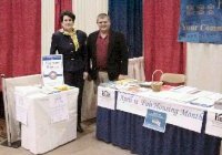 [Photo 1: Katharine Daly, Executive Director of the New Hampshire Human Rights Commission and Bob Grenier, Operations Specialist, at the HUD Home Show booth]