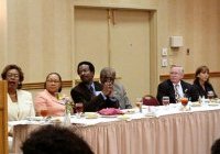 [Photo 2: Presenters at Fair Housing Forum]