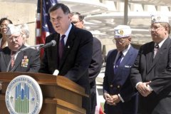 [Photo 2: Secretary Martinez speaks to HUD employees and veterans' groups]
