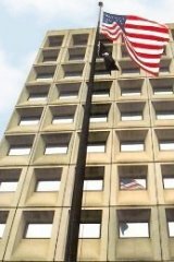 [Photo 5: The American Flag and POW-MIA flag in front of HUD headquarters ]