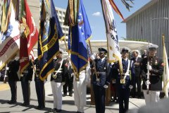 [Photo 6: Color guard in front of HUD headquarters.]