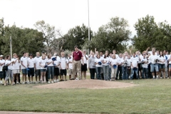 [Photo 4: HUD Regional Director John Carson throws the first pitch.]