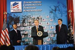 [Photo: President Bush speaks at HUD with Deputy Secretary Jackson and Secretary Martinez.]