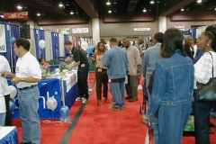 [Photo 1: Attendees at the 12th Annual Black Exposition.]