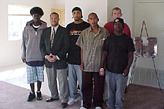 [Photo 1: Abdur-Rahim Hameed and some of the Youthbuild workers.]