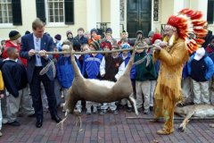 [Photo: Chief Swift Water presents a deer to Virginia Governor Mark Warner]