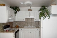 [Photo 1: A refurbished kitchen]