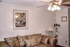 [Photo 2: A refurbished living room]