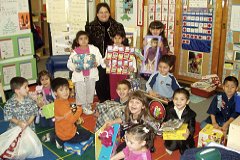 [Photo 1: Della Lucero and the Greenlee Elementary School Head Start children]
