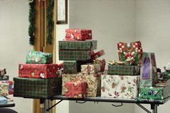[Photo 1: A pile of gifts for the Tapia family.]