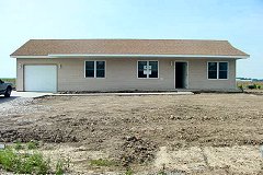 [Photo 1: A section 8 homeownership house completed by North East Community Action Corporation (NECAC).]