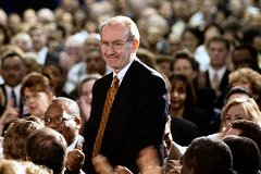 [Photo: Larry Thompson was singled out for honors by President George W. Bush when he visited HUD in April, 2002.]