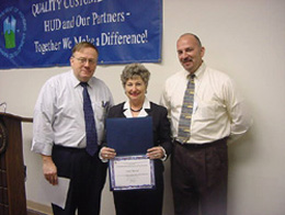 [Photo: Left to right: Ben Cook, Carol Beeler, and Tom Bilodeau]