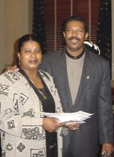 [Photo 1: Lisette Beausejour joined her husband and became a citizen] 