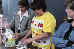 [Photo 2: HUD staff creating gift baskets]