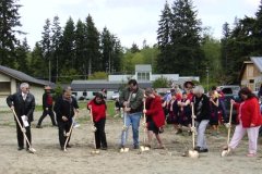 [Photo 1: Tribal officials with shovels in hands ready to break ground]