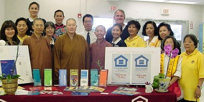 [Photo 1: Members of the Buddha Light Internal Association at the West Ridge Middle School]