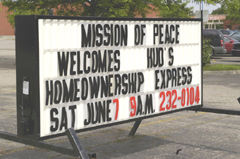 [Photo 1: Welcome sign that reads Mission of peace welcome HUD's Homeownership express.]
