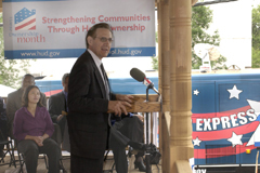 [Photo 1: Mayor Randy Kelly at the podium]