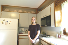 [Photo 3: Shannon Rosenbeck in the kitchen]