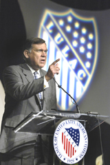 [Photo 2: Secretary Martinez addressing the audience at the annual LULAC Convention]