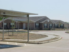 [Photo 3: View of the homes]