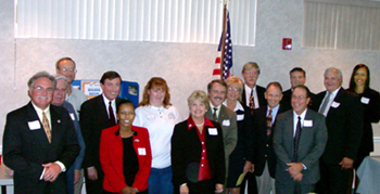 [Photo 3: Representatives from different agencies posing to the camera]