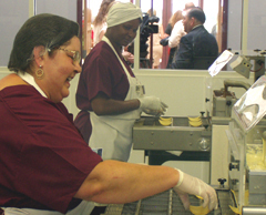 [Photo 2:  Cooks preparing chocolate]
