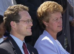 [Photo 3: Mr. Barrales and Mrs. Sudduth listening to the speakers]