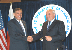 [Photo of Secretary Martinez shaking hands with his Russian counterpart, Nicolay Koshman]