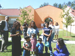 [Photo 1: Farmworkers and their children are in the courtyards]