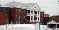[Photo 1: Former Littleton Hospital]