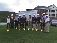 [Photo 2: Ceremonial groundbreaking]