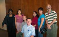 [Photo 3: Christian and his team.(l-r) Bettye Gaiter (Wells Fargo), Cecilia Cervantes (CHAC), Christian, Larry Kresyman (Century 21), mother Christina, sister Christina, Joe Hughes (Denver Housing Authority)]